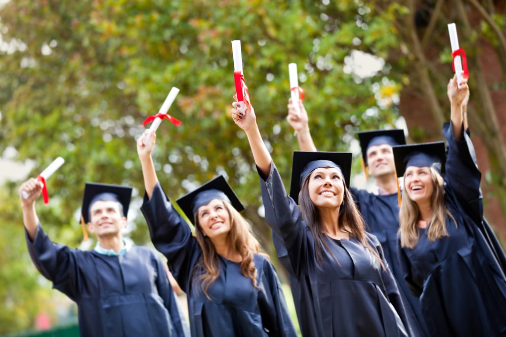 Group of successful students on their graduation day